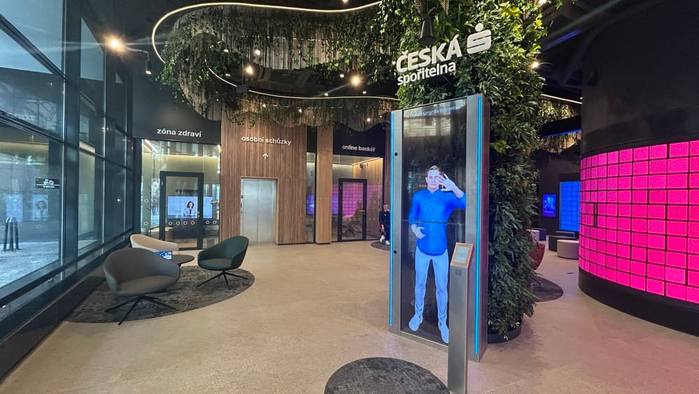 Česká spořitelna Future Lab, the Promethist Engage digital human kiosk in the banking hall at Na Perštýně, Prague